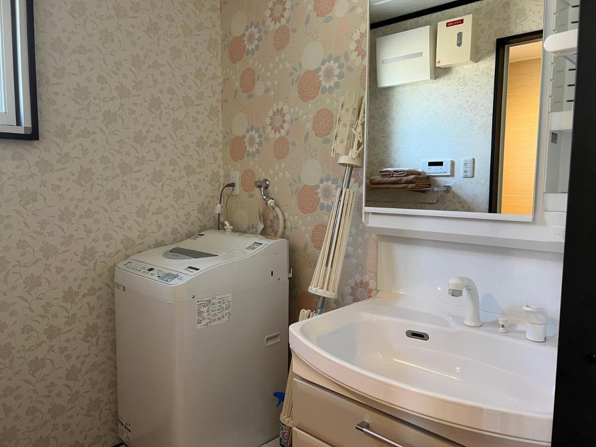 Ocean Front Sumuide Apartment Nago Ngoại thất bức ảnh
