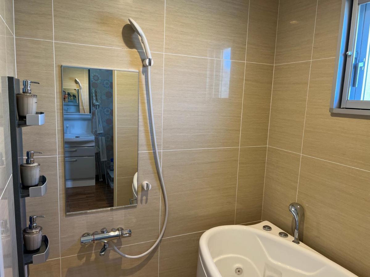 Ocean Front Sumuide Apartment Nago Ngoại thất bức ảnh
