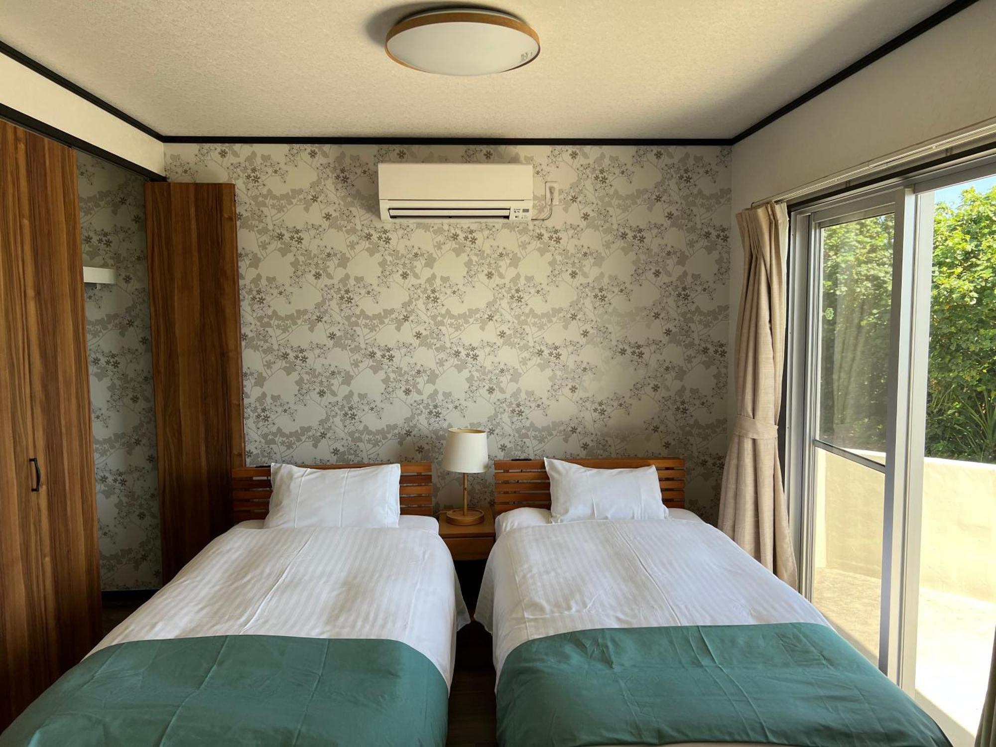 Ocean Front Sumuide Apartment Nago Ngoại thất bức ảnh